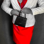 Man styled in a skirt with coordinated accessories