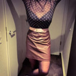 Man wearing a skirt paired with a fitted top