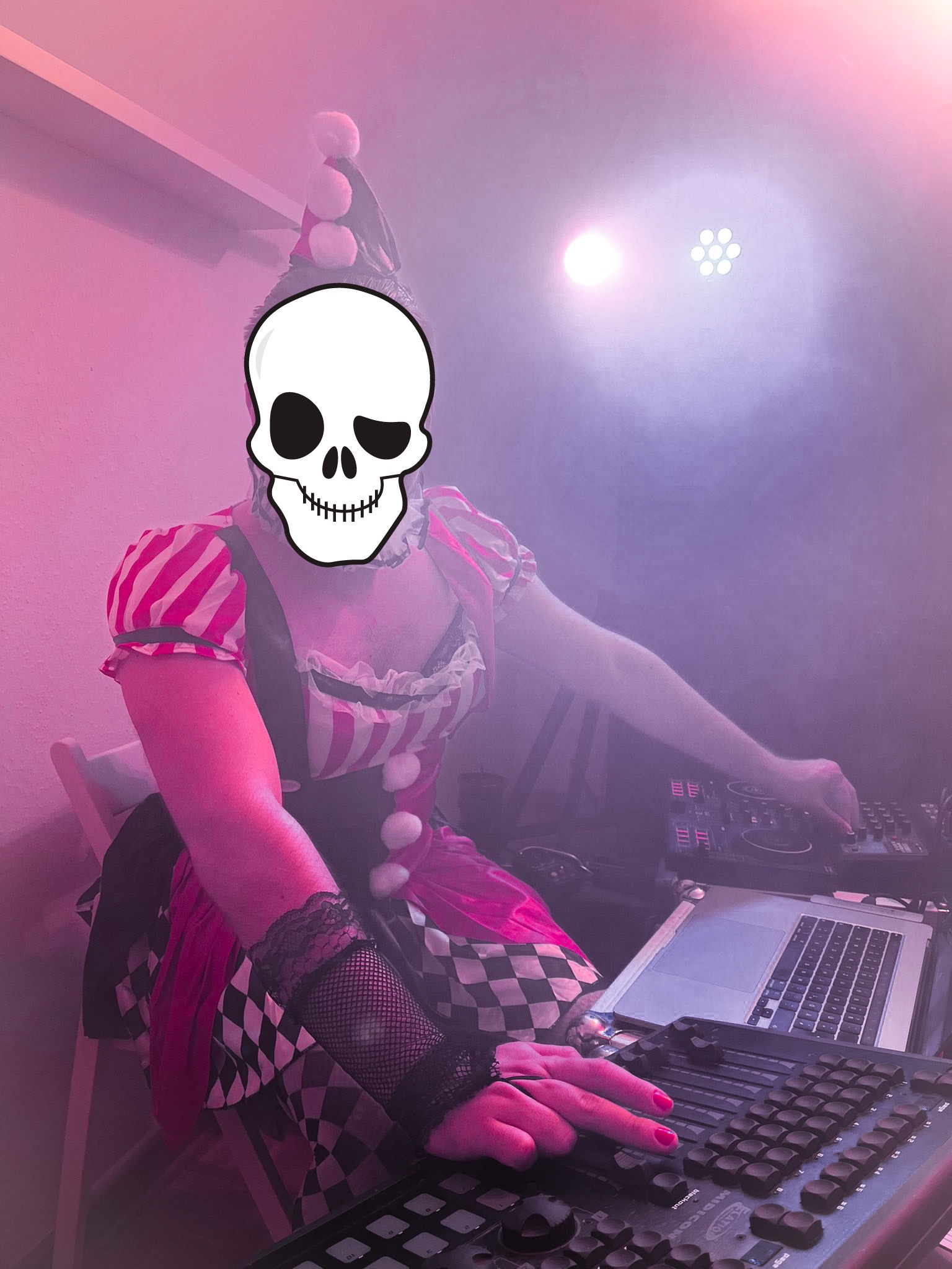 Harlequin Halloween outfit paired with ankle boots