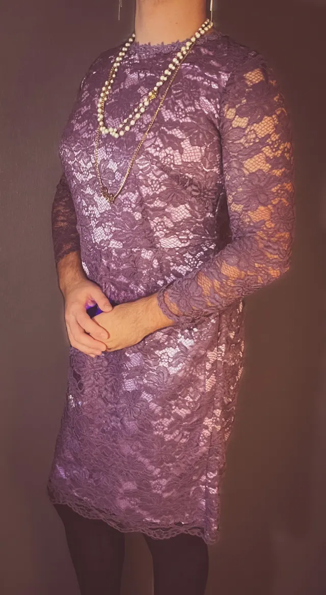 Man standing in a cocktail dress