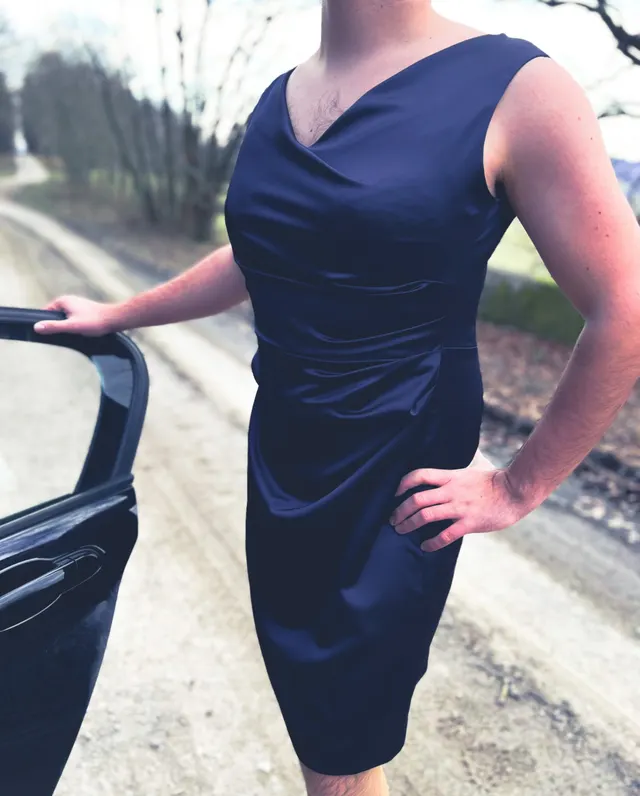 Man wearing a blue dress